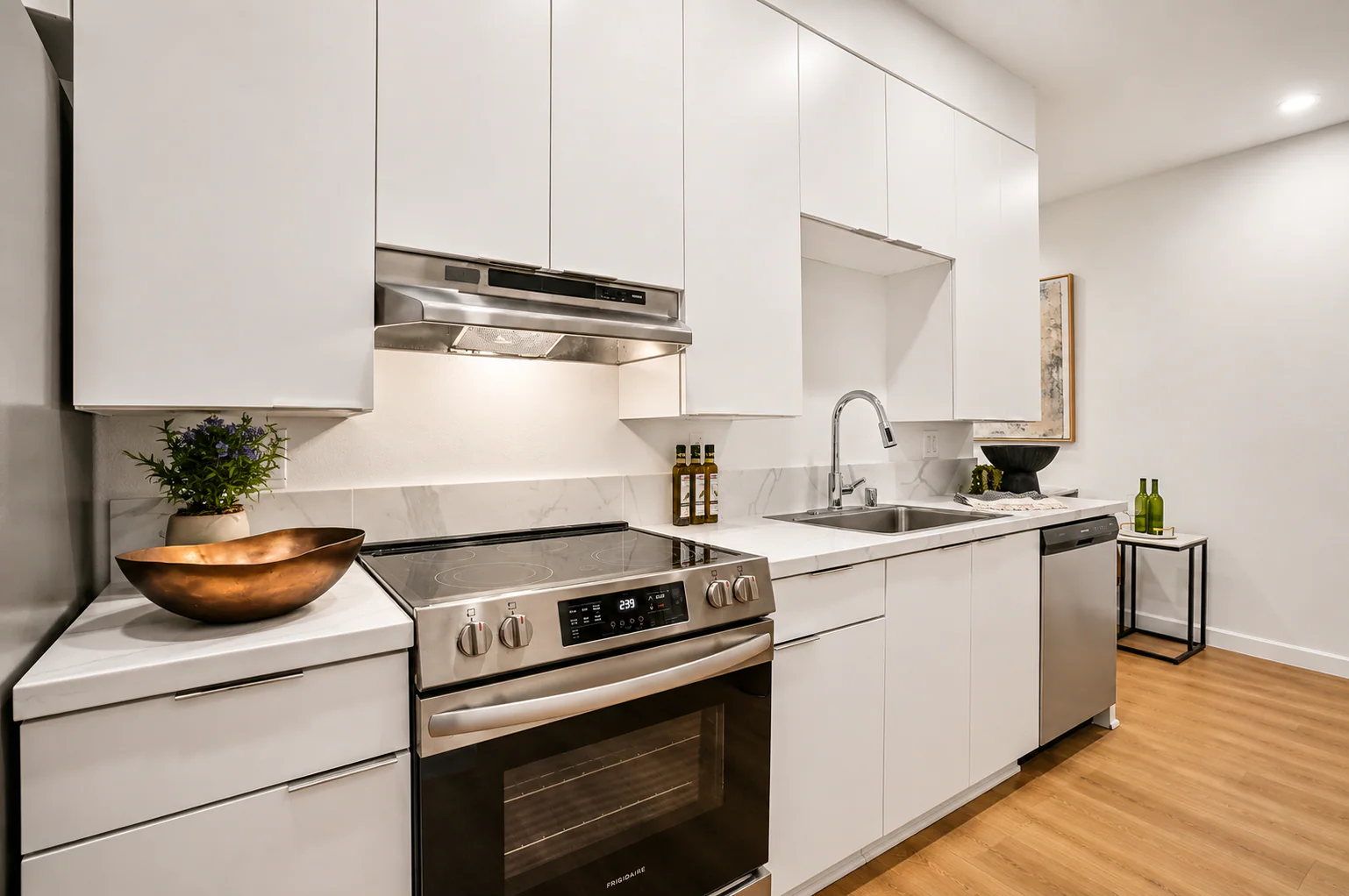 Modern kitchen with stainless appliances at Haven on Orange